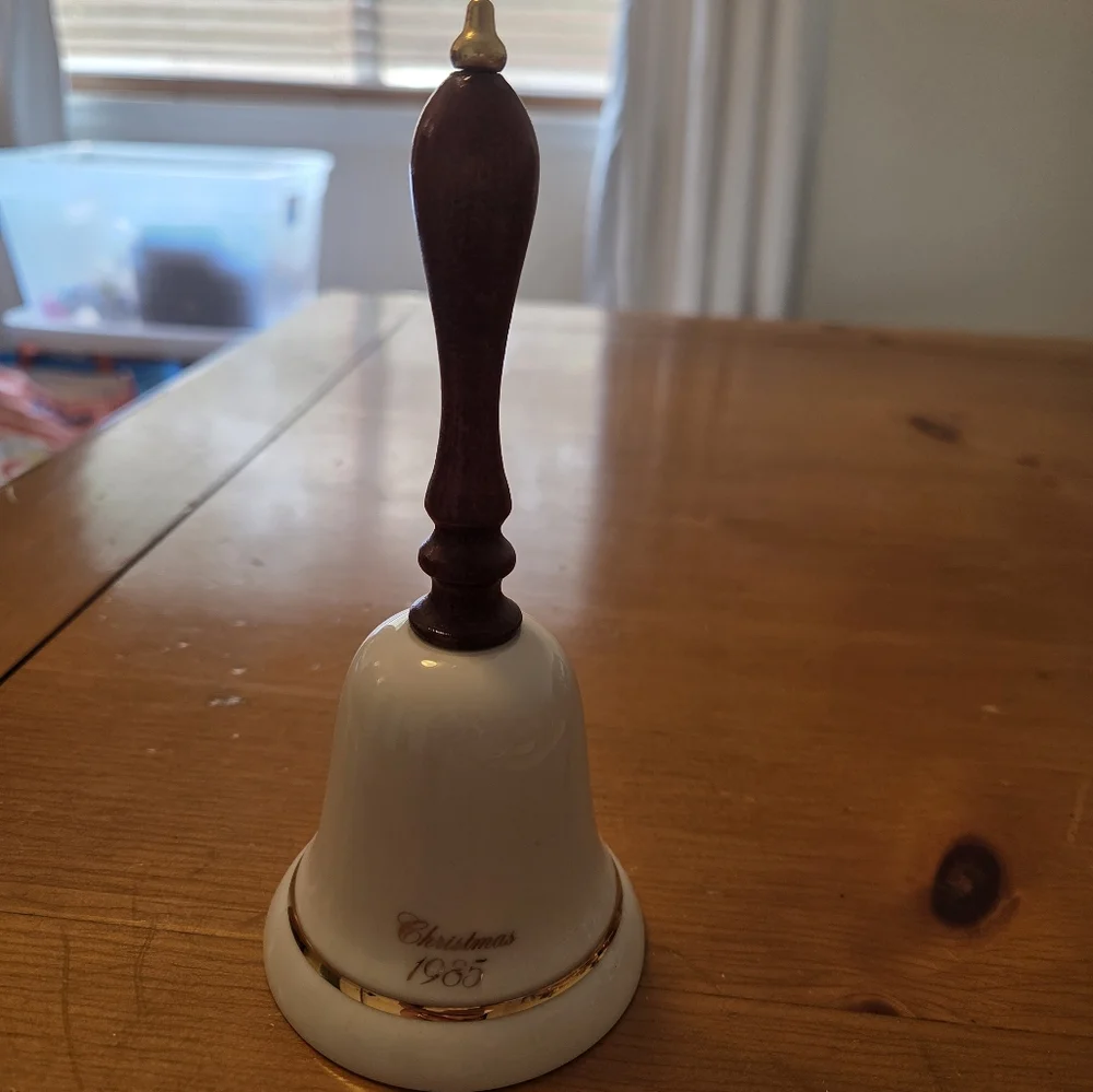 Avon 1985 Porcelain Holiday Bell With Wooden Handle
